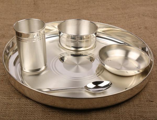 silver bowl and spoon for baby feeding